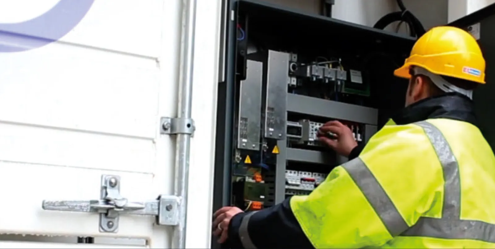 Man looking at Mobile Ripening Unit Controls